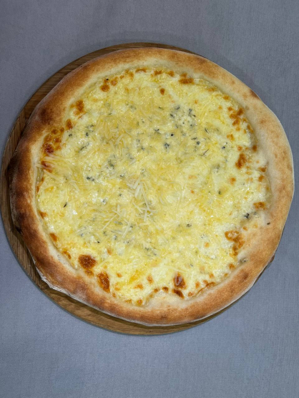 Пицца четыре сыра